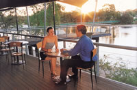 A young couple enjoying the lifesyle at a local cafe